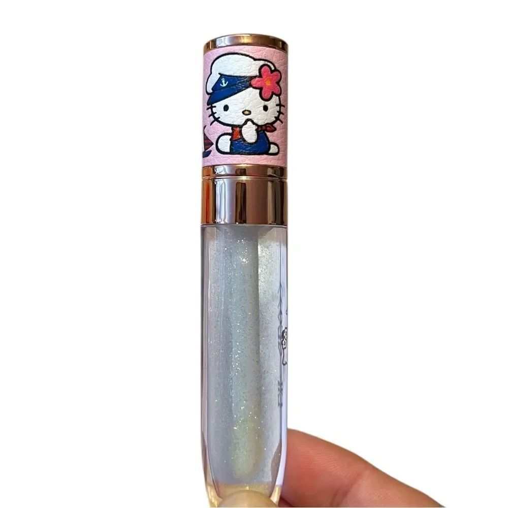 🤯5/$25🤯 Hello Kitty Glimmering Clear Lip Gloss With Silver Sparkle - Picture 2 of 3